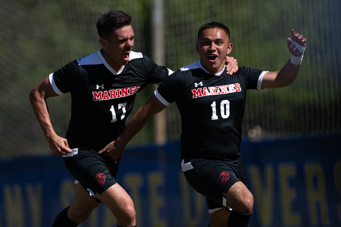 Marine Sgt. Carlos Vazquezperez of MCB Hawaii celebrates his goal with Capt. Mats Bjurman of MCB Camp Pendleton, Calif. during the 2024 Armed Forces Men's Soccer Championship hosted by Marine Corps Logistics Base Albany, Georgia at Albany State University from April 2-10. The Armed Forces Championship features teams from the Army, Marine Corps, Navy (with Coast Guard players), and Air Force (with Space Force players). (DoD photo by EJ Hersom)