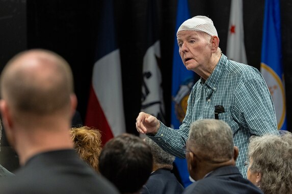 Retired U.S. Army Mater Sgt. Robert Cansler encourages fellow Vietnam War veterans to take Honor Flights to see the Vietnam War Memorial during the U.S. Army Financial Management Command’s Vietnam War commemoration at the Maj. Gen. Emmett J. Bean Federal Center in Indianapolis March 25, 2024. Cansler enlisted in the U.S. Army in 1961, served as a flight engineer on the Army’s newly minted AC-1 and CV-2 Caribou aircraft, served two tours in Vietnam, and eventually transferred to the Army’s Finance Corps as an accountant. (U.S. Army photo by Mark R. W. Orders-Woempner)
