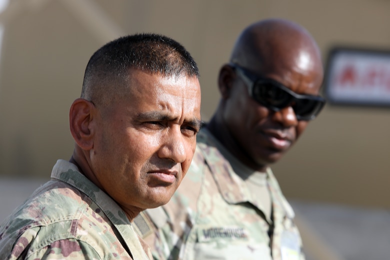 U.S. Army Col. Mohammed Z. Rahman, U.S. Army Corps of Engineers Transatlantic Expeditionary commander (left), along with Command Sgt. Maj. Clifton D. Morehouse, USACE Transatlantic Division senior enlisted advisor (right), assess infrastructure projects in support of Combined Joint Task Force – Operation Inherent Resolve in Iraq, Sept. 15, showcasing the leadership and commitment that drive USACE's efforts in advancing infrastructure developments across the U.S. Central Command region, including Kuwait. (U.S. Army Photo by Richard Rzepka)