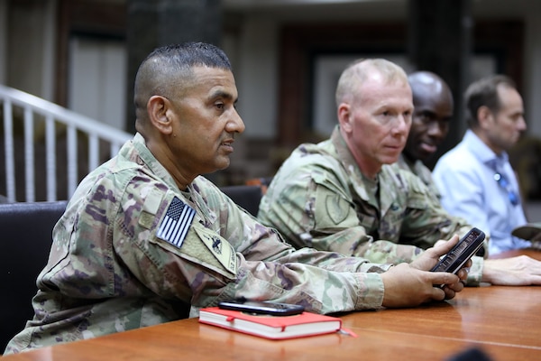 U.S. Army Col. Mohammed Z. Rahman, U.S. Army Corps of Engineers Transatlantic Expeditionary commander (left), along with Brig. Gen. William C. Hannan, Jr., USACE Transatlantic Division commanding general (right), discuss infrastructure projects at a meeting in Iraq, Sept. 15, showcasing the leadership and commitment that drive USACE's efforts in advancing infrastructure developments across the U.S. Central Command region, including Kuwait. (U.S. Army Photo by Richard Rzepka)