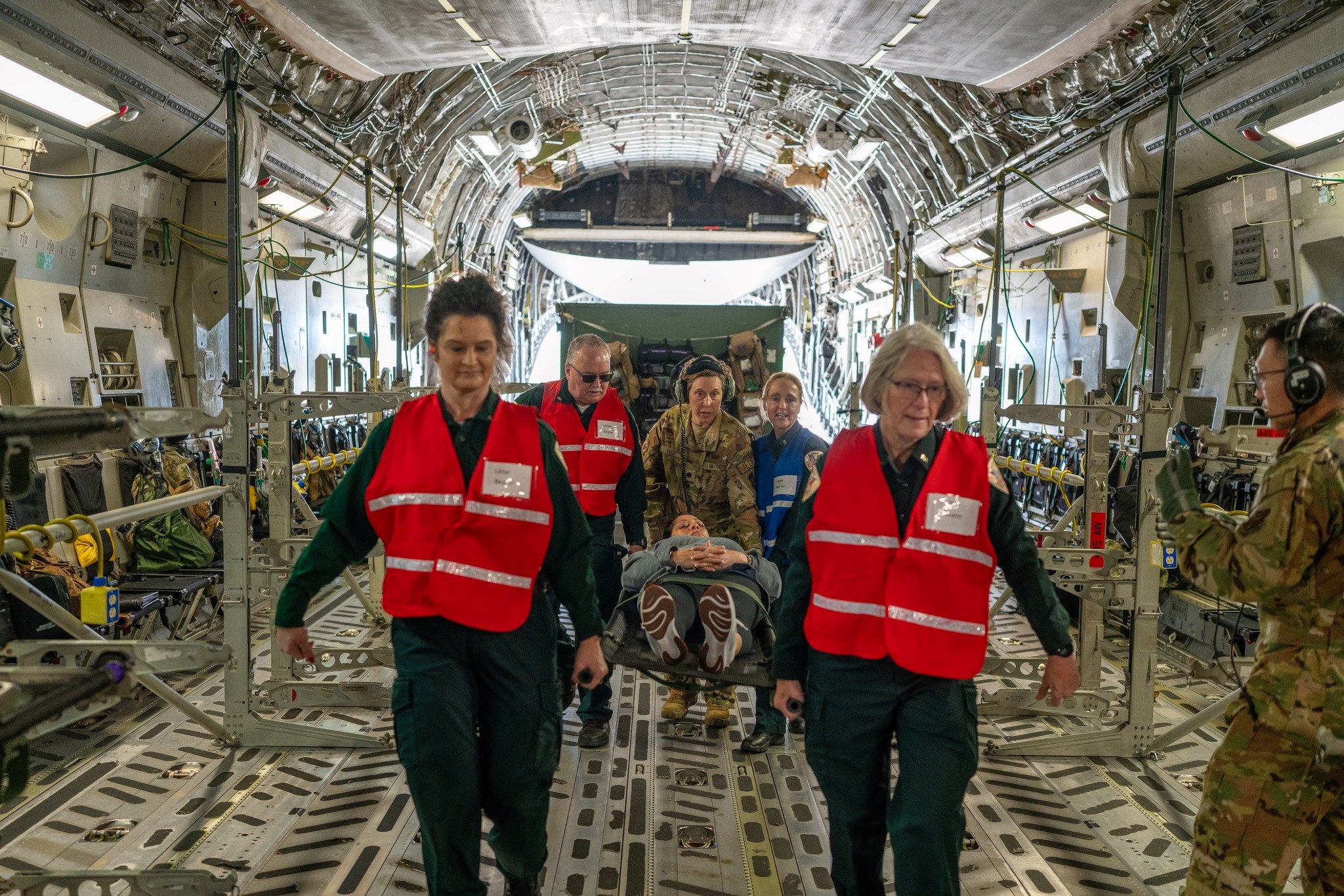 Airmen from the 164th Airlift Wing and 12 other agencies participate in the Patriot South exercise at the Memphis Air National Guard Base in Memphis, Tenn. February 22, 2024. This joint exercise simulates bringing patients to Memphis for emergency services to triage and offer them care. 
