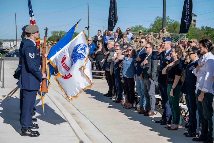 A color guard comprised of various Airmen present the colors.