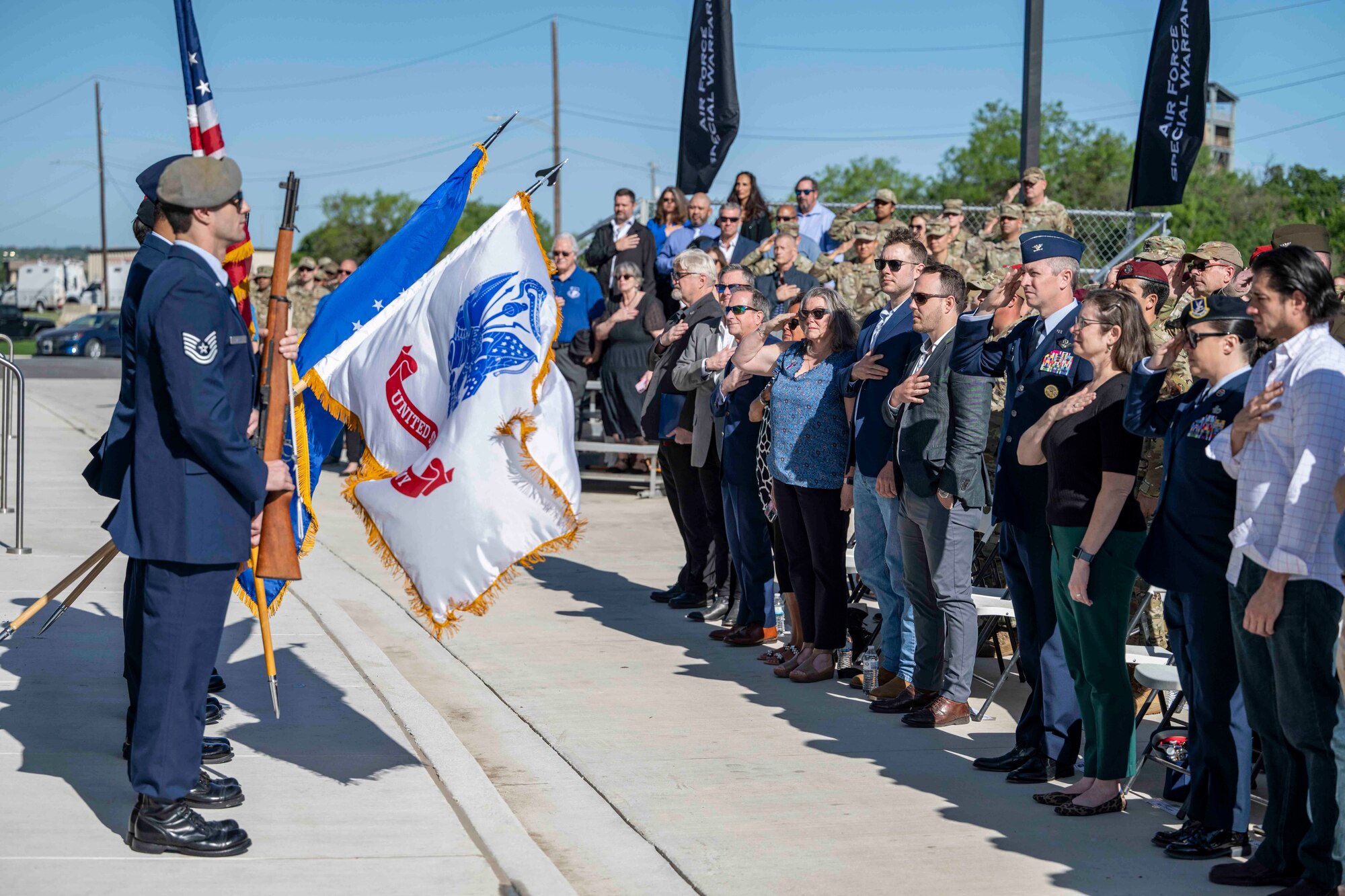 A color guard comprised of various Airmen present the colors.