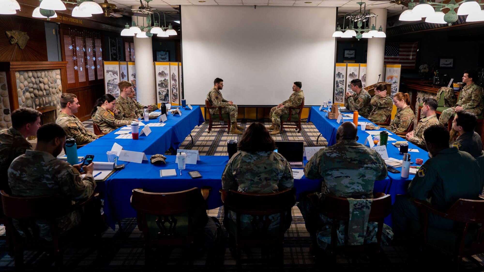 Members of a Flight Commander Course navigate through a scenario.