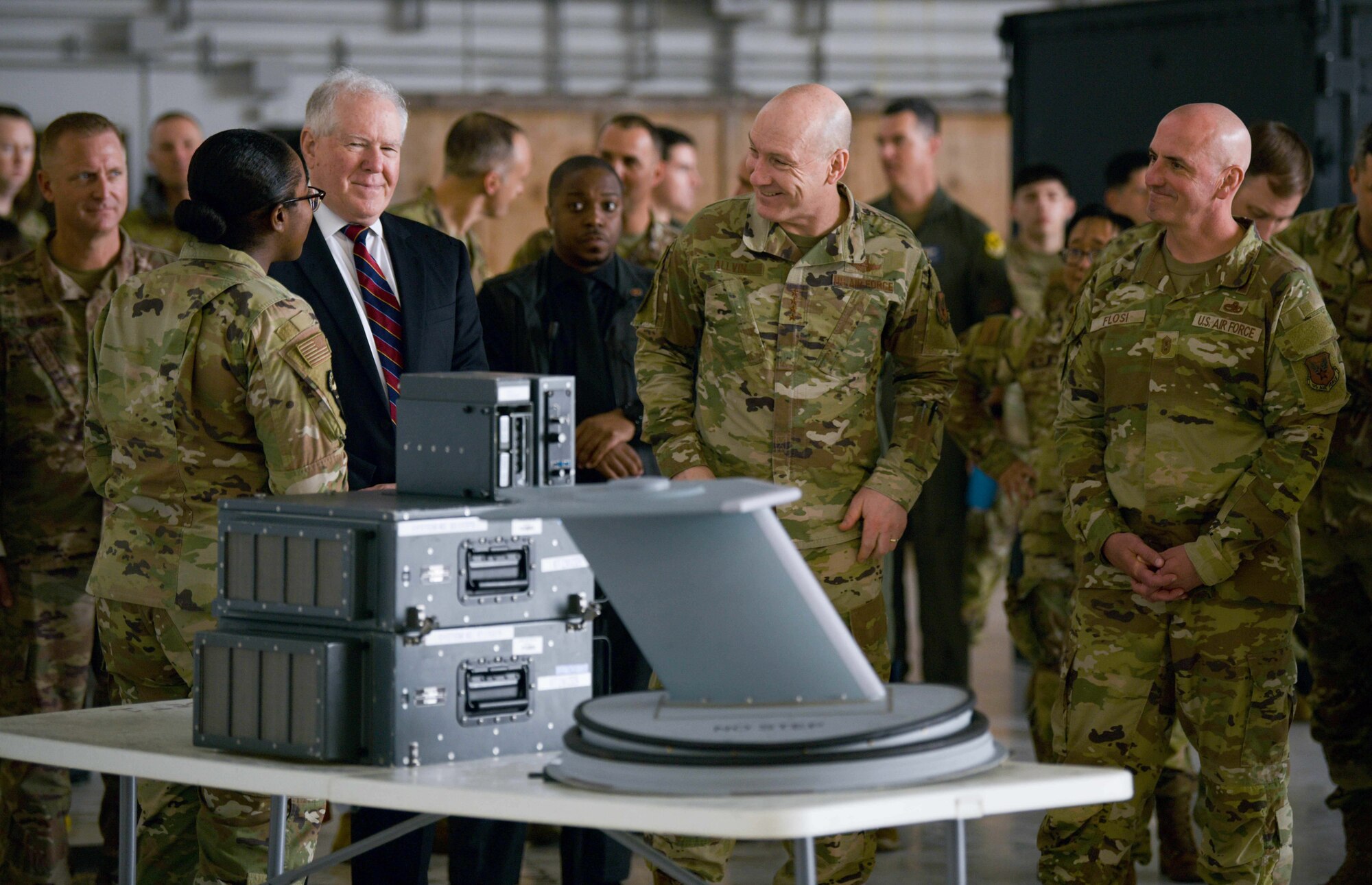 A Kadena Airman briefs Secretary of the Air Force Frank Kendall, Air Force Chief of Staff Gen. David Allvin, and Chief Master Sergeant of the Air Force David Flosi, on the agile combat employment capabilities of Kadena Air Base, Japan, during their visit, April 6, 2024.