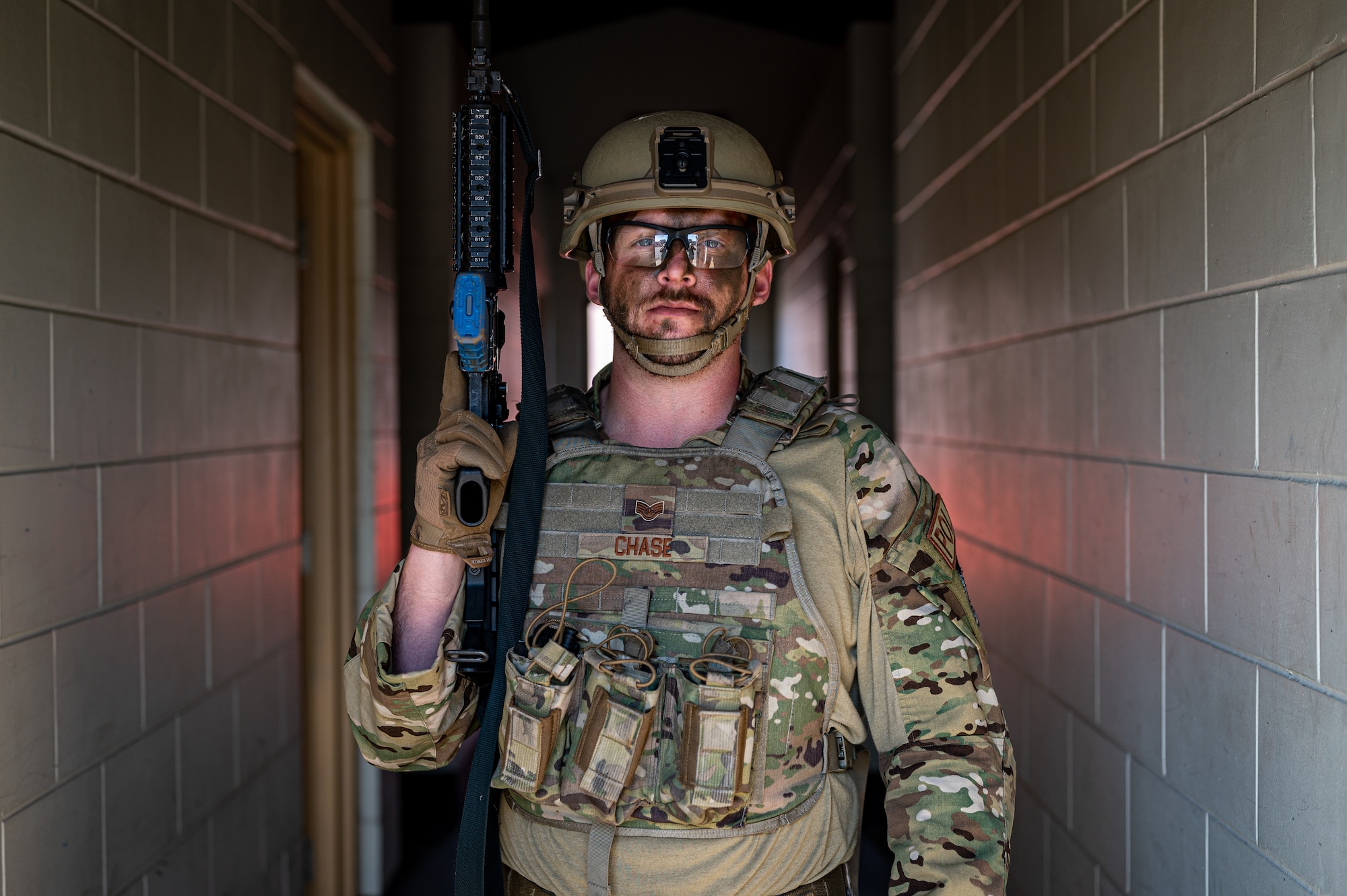 U.S. Air Force Staff Sgt. Chandler Chase, 51st Logistics Readiness Squadron fuels supervisor, poses for a portrait during a Combat Readiness Course at Osan Air Base, Republic of Korea, March 14, 2024. The CRC trains 51st Fighter Wing Airmen on base defense procedures, preparing them to tackle any challenge and deter any adversary during contingency operations. Throughout the course, Chase was trained on diverse base defense tactics like weapon safety and manipulation, tactical casualty combat care, mounted and dismounted operations, close quarters combat and more. (U.S. Air Force photo by Staff Sgt. Thomas Sjoberg)