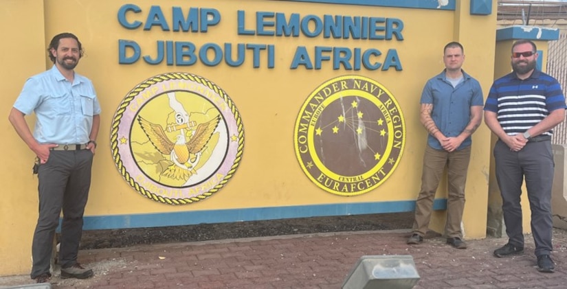 Army CID Special Agents stand at the entrance of Camp Lemonnier in the Republic of Djibouti.