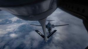 A U.S. Air Force B-1 Lancer from Ellsworth Air Force Base, S.D., departs from a KC-135 Stratotanker from Royal Air Force Mildenhall, England, after receiving fuel over an undisclosed location, Feb. 29, 2024. Bomber Task Force missions familiarize aircrew with air bases and operations in different geographic combatant command areas of operations to enable strategic access and integration with coalition forces in an effort to deter global conflict. (U.S. Air Force photo by Senior Airman Viviam Chiu)