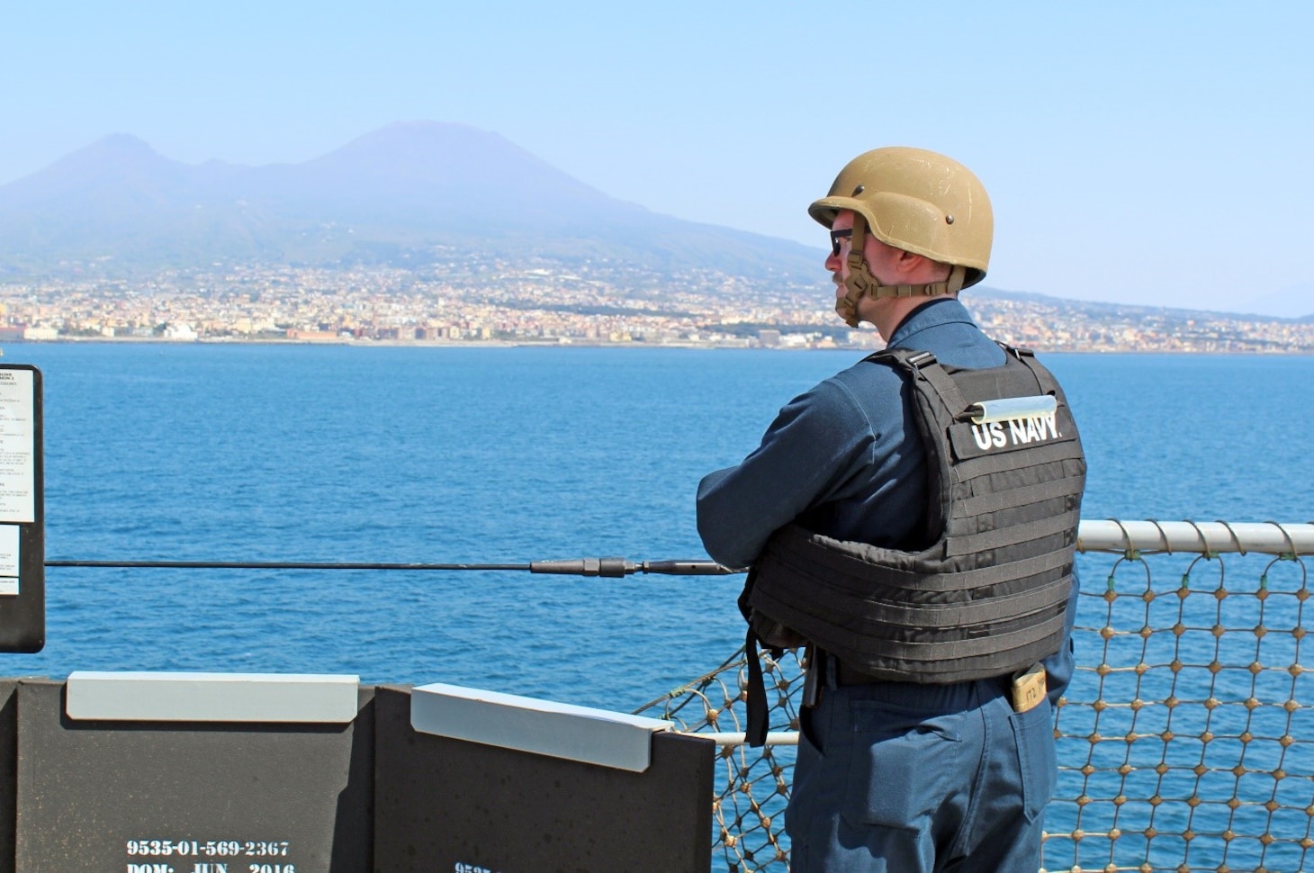 240407-N-JC445-1002 NAPLES, Italy (April 7, 2024) Information Systems Technician 2nd Class Landry Spence, observes sea and anchor detail aboard the Blue Ridge-class command and control ship USS Mount Whitney (LCC 20) as it arrives in Naples, Italy. Mount Whitney, the U.S. Sixth Fleet flagship, is on a scheduled port visit to participate in the 75th anniversary of the NATO Alliance and enhance U.S.-Italian relations. Homeported in Gaeta, Mount Whitney operates with a combined crew of U.S. Sailors and Military Sealift Command civil service members. (U.S. Navy photo by Mass Communication Specialist 2nd Class Mario Coto)
