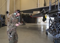 Staff Sgt. Colby Ballou, 104th Maintenance Group flightline avionics technician, performs aircraft operational checkouts on an F-15 Eagle, February 29, 2024, at Barnes Air National Guard Base, Massachusetts. Ballou is one of 21 Airmen from the 104th Fighter Wing selected for the Wing's core cadre program which sends Airmen to active duty F-35 bases for two years to train and learn the aircraft in preparation for the 104FW's conversion.  (U.S. Air National Guard photo by Tech. Sgt. Sara Kolinski)