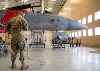 Staff Sgt. Colby Ballou, 104th Maintenance Group flightline avionics technician, performs aircraft operational checkouts on an F-15 Eagle, February 29, 2024, at Barnes Air National Guard Base, Massachusetts. Ballou is one of 21 Airmen from the 104th Fighter Wing selected for the Wing's core cadre program which sends Airmen to active duty F-35 bases for two years to train and learn the aircraft in preparation for the 104FW's conversion.  (U.S. Air National Guard photo by Tech. Sgt. Sara Kolinski)