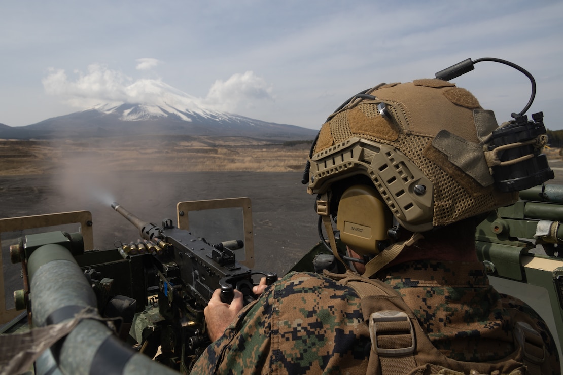 U.S. Marine Corps Gunnery Sgt. Travis Main, a ground operations specialist with Battalion Landing Team 1/1, 31st Marine Expeditionary Unit, fires a mounted .50 caliber machine gun during an immediate action upon contact exercise at Combined Arms Training Center Camp Fuji, Japan, April 2, 2024. Marines conducted the exercises utilizing joint light tactical vehicles to ensure rapid and effective response to enemy threats and enhance combat readiness. The 31st MEU, the Marine Corps’ only continuously forward-deployed MEU, provides a flexible and lethal force ready to perform a wide range of military operations as the premiere crisis response force in the Indo-Pacific region.