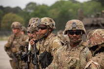 Soldiers with the 5th Squadron, 7th Cavalry Regiment, 1st Armored Brigade Combat Team (5-7 CAV), 3rd Infantry Division (3ID) attend a briefing for the Swamp Avenger readiness exercise at Hunter Army Airfield, Savannah, Georgia, Apr. 2, 2024.