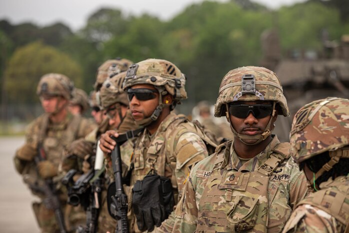 Soldiers with the 5th Squadron, 7th Cavalry Regiment, 1st Armored Brigade Combat Team (5-7 CAV), 3rd Infantry Division (3ID) attend a briefing for the Swamp Avenger readiness exercise at Hunter Army Airfield, Savannah, Georgia, Apr. 2, 2024.