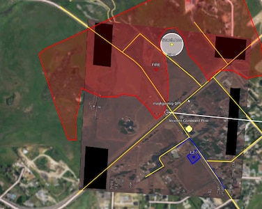 A screenshot from a video demonstration outlines the use of artificial intelligence to create augmentations for full-motion video, matching geographic features to align live imagery, identify roads, key landmarks and other mission-essential data. The demonstration highlighted Project Theia, a National Guard-based initiative to speed communications via AI while also eliminating errors for analysts and ground-based responders to wildfires.