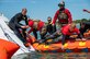 Cape Canaveral SFS, April 2024 - A multinational team of rescue specialists, including three members from the Royal Canadian Air Force Search and Rescue along with Pararescue Specialist from the 38th Rescue Squadron from Moody AFB, Ga., underwent rigorous training at the Rescue Force Qualification Course taught by 1 AF, Det 3 Rescue Instructor Cadre. The course prepares rescue forces for alert posturing through comprehensive academics, ground, and water operations. Trainees are immersed in space medicine basics and trained on a practice spacecraft analogue for crew capsule functionalities, astronaut extrication techniques, and spacecraft hazard identification, culminating in capsule up-righting drills. This collaboration, requested by NASA, aims to broaden rescue capabilities for Commercial Crew Program launches and foster a closer bond between Det 3/SOC and the Joint Rescue Coordination Centre, streamlining communication for global rescue missions.