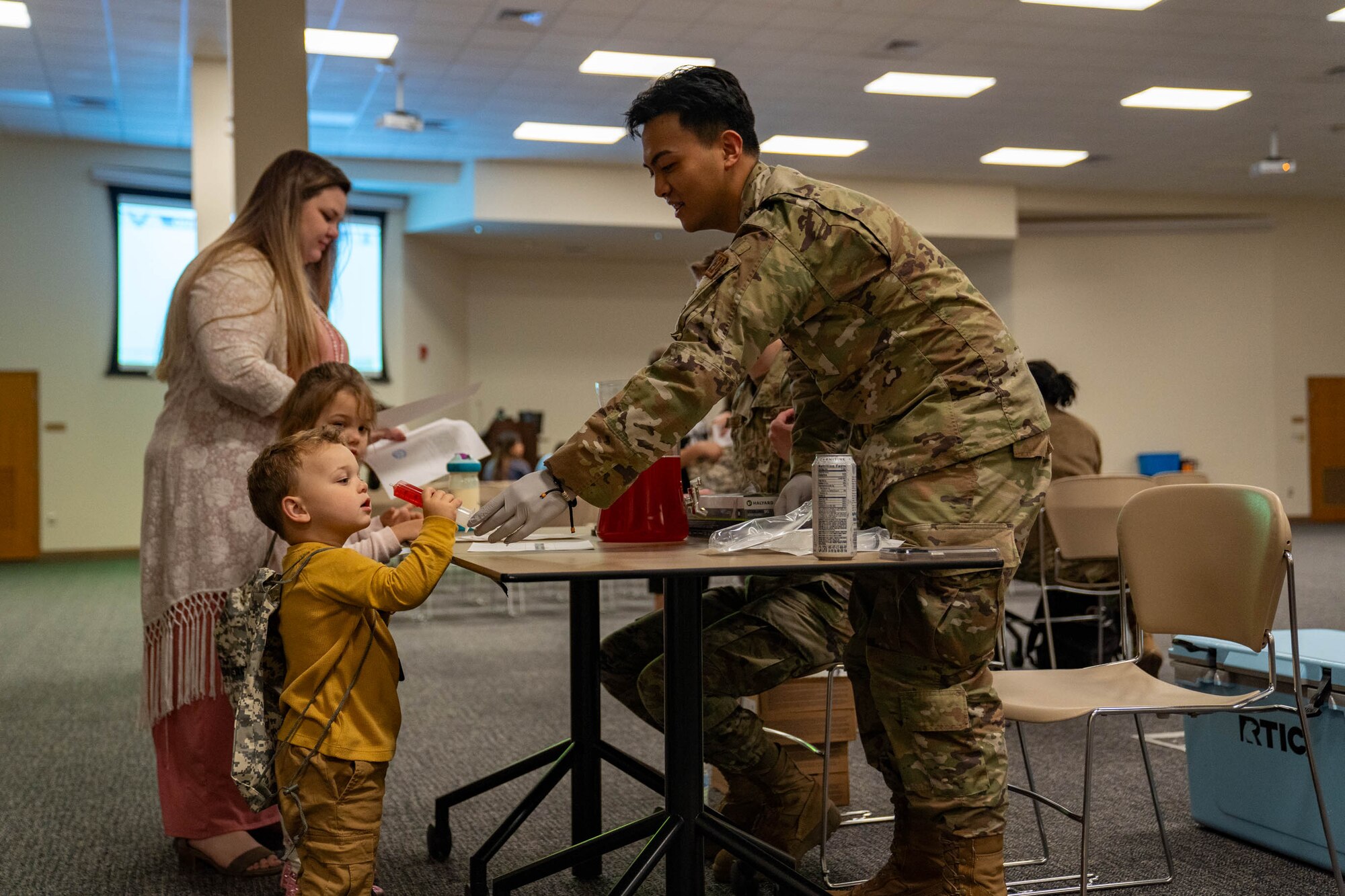 Airmen from the 81st Medical Group Immunization Clinic simulate giving medicine to military children during Operation HERO at Keesler Air Force Base, Mississippi, April 6, 2024.