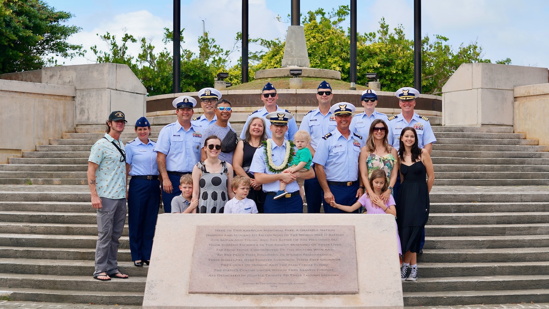 Lt. Justin Miller, commanding officer of Marine Safety Unit Saipan, and assembled members, friends, and family stand for a photo following a ceremony to formally establish MSU Saipan in Garapan at the American Memorial Park on April 5, 2024. This significant achievement marks a milestone in leadership evolution and responsibility expansion within the U.S. Coast Guard, reflecting steadfast commitment to serving the people of Saipan and the Commonwealth of the Northern Marianas Islands (CNMI) with unparalleled dedication and excellence. The change is part of an initiative to provide junior officers with increased command opportunities, fostering professional growth and leadership development within the ranks. Eighteen marine safety detachments are converting to marine safety units. (U.S. Coast Guard photo by Chief Warrant Officer Sara Muir)