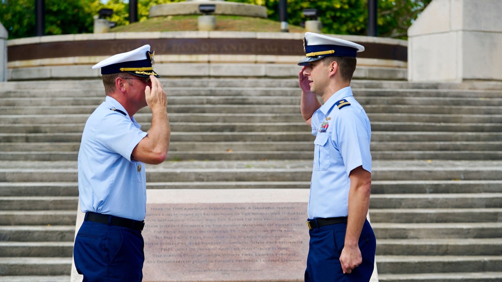 Lt. Justin Miller, commanding officer of Marine Safety Unit Saipan, salutes Capt. Nicholas Simmons, commander of U.S. Coast Guard Forces Micronesia/Sector Guam, at a ceremony to formally establish MSU Saipan in Garapan at the American Memorial Park on April 5, 2024. This significant achievement marks a milestone in leadership evolution and responsibility expansion within the U.S. Coast Guard, reflecting steadfast commitment to serving the people of Saipan and the Commonwealth of the Northern Marianas Islands (CNMI) with unparalleled dedication and excellence. The change is part of an initiative to provide junior officers with increased command opportunities, fostering professional growth and leadership development within the ranks. Eighteen marine safety detachments are converting to marine safety units. (U.S. Coast Guard photo by Chief Warrant Officer Sara Muir)