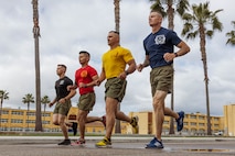 U.S. Marine Corps drill masters with Recruit Training Regiment, lead the formation during a motivational run at Marine Corps Recruit Depot San Diego, California, April 4, 2024.  The motivational run is the last physical training exercise Marines conduct while at MCRDSD. (U.S. Marine Corps photo by Cpl. Sarah M. Grawcock)
