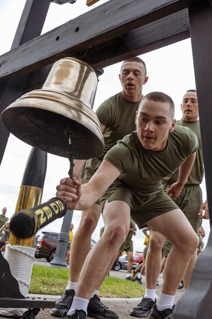 New U.S. Marines with Hotel Company, 2nd Recruit Training Battalion, ring the 2nd Battalion bell during their motivational run at Marine Corps Recruit Depot San Diego, California, April 4, 2024. The motivational run is the last physical training exercise Marines conduct while at MCRDSD. (U.S. Marine Corps photo by Cpl. Sarah M. Grawcock)
