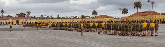 New U.S. Marines with Hotel Company, 2nd Recruit Training Battalion, conduct warm-up exercises before their motivational run at Marine Corps Recruit Depot San Diego, California, April 4, 2024. The motivational run is the last physical training exercise Marines conduct while at MCRDSD. (U.S. Marine Corps photo by Cpl. Sarah M. Grawcock)