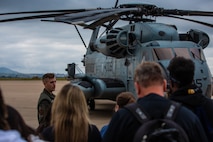 U.S. Marine Corps Sgt. Jason Cremi, Crew Chief, Marine Heavy Helicopter Squadron 361, 3rd Marine Aircraft Wing, gives educators with Recruiting Stations’ Albuquerque, Denver, Houston, and Salt Lake City an overview of the capabilities of the CH-53E Super Stallion as part of the 2024 Educator’s Workshop, April 4, 2024 at Marine Corps Air Station Miramar, California. Participants of the workshop visit MCRD San Diego to observe recruit training and gain a better understanding about the transformation from recruits to United States Marines. Educators also received classes and briefs on the benefits that are provided to service members serving in the United States armed services. (U.S. Marine Corps photo by Sgt. Trey Q. Michael)