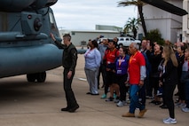 U.S. Marine Corps Sgt. Jason Cremi, Crew Chief, Marine Heavy Helicopter Squadron 361, 3rd Marine Aircraft Wing, gives educators with Recruiting Stations’ Albuquerque, Denver, Houston, and Salt Lake City an overview of the capabilities of the CH-53E Super Stallion as part of the 2024 Educator’s Workshop, April 4, 2024 at Marine Corps Air Station Miramar, California. Participants of the workshop visit MCRD San Diego to observe recruit training and gain a better understanding about the transformation from recruits to United States Marines. Educators also received classes and briefs on the benefits that are provided to service members serving in the United States armed services. (U.S. Marine Corps photo by Sgt. Trey Q. Michael)