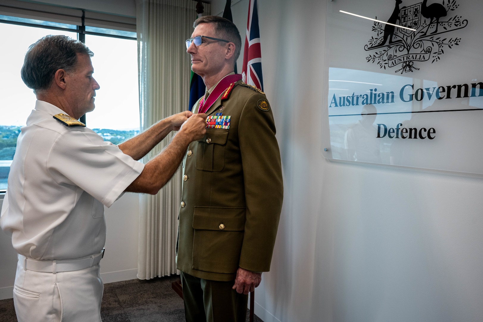 Australia Chief of the Defence Force Gen. Angus Campbell receives the Legion of Merit pinned by Adm. John C. Aquilino, Commander of U.S. Indo-Pacific Command, in Canberra, Australia, on April 8, 2024. The Legion of Merit is the highest accolade that the U.S. can bestow upon a foreign leader; it is reserved for individuals who have shown exceptionally meritorious conduct in the performance of outstanding services. USINDOPACOM is committed to enhancing stability in the Indo-Pacific region by promoting security cooperation, encouraging peaceful development, responding to contingencies, deterring aggression and, when necessary, fighting to win. (U.S. Navy photo by Chief Mass Communication Specialist Shannon M. Smith)