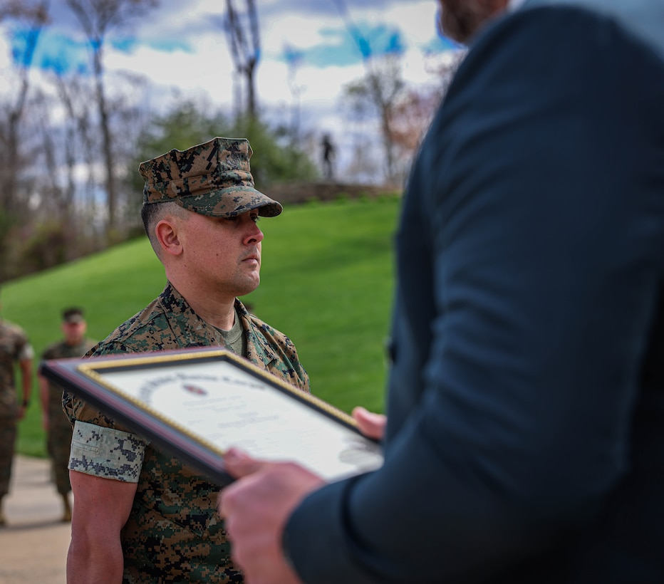 U.S. Marine Corps Staff Sgt. Jonathan Cerecedes, a Surprise, Arizona, native and watch commander with Provost Marshal Office on Marine Corps Base Quantico, conducts his meritorious promotion ceremony to gunnery sergeant at the National Museum of the Marine Corps, Triangle, Virginia, April 5, 2024. Cerecedes competed with approximately 13,000 staff sergeants in the Marine Corps for 21 slots to meritoriously promote to gunnery sergeant, and beat about 99 percent of the Marines for that promotion. (U.S. Marine Corps photo by Lance Cpl. Sean R. LeClaire)