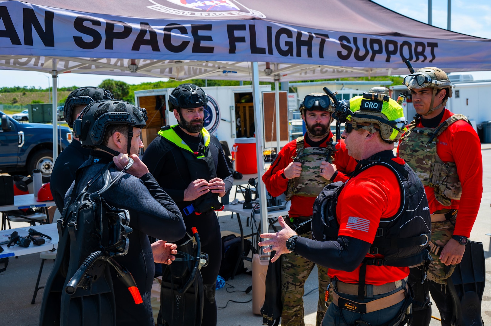 Cape Canaveral SFS, April 2024 - A multinational team of rescue specialists, including three members from the Royal Canadian Air Force Search and Rescue along with Pararescue Specialist from the 38th Rescue Squadron from Moody AFB, Ga., underwent rigorous training at the Rescue Force Qualification Course taught by 1 AF, Det 3 Rescue Instructor Cadre. The course prepares rescue forces for alert posturing through comprehensive academics, ground, and water operations. Trainees are immersed in space medicine basics and trained on a practice spacecraft analogue for crew capsule functionalities, astronaut extrication techniques, and spacecraft hazard identification, culminating in capsule up-righting drills. This collaboration, requested by NASA, aims to broaden rescue capabilities for Commercial Crew Program launches and foster a closer bond between Det 3/SOC and the Joint Rescue Coordination Centre, streamlining communication for global rescue missions.