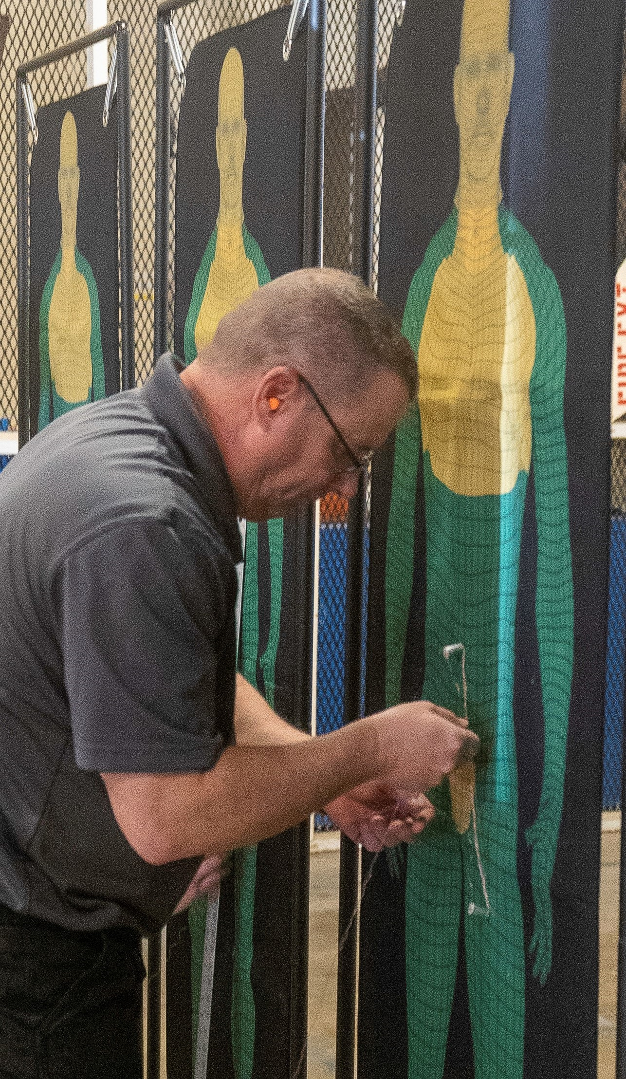 Keith Collins, Air Force Non-Lethal Weapons Program support officer, marks probe placement during the Air Force Security Forces Center’s recent human electro-muscular incapacitation limited user evaluation. (Photo courtesy Joint Intermediate Force Capabilities Office)