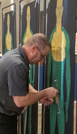 Collins marking a target near the mid section