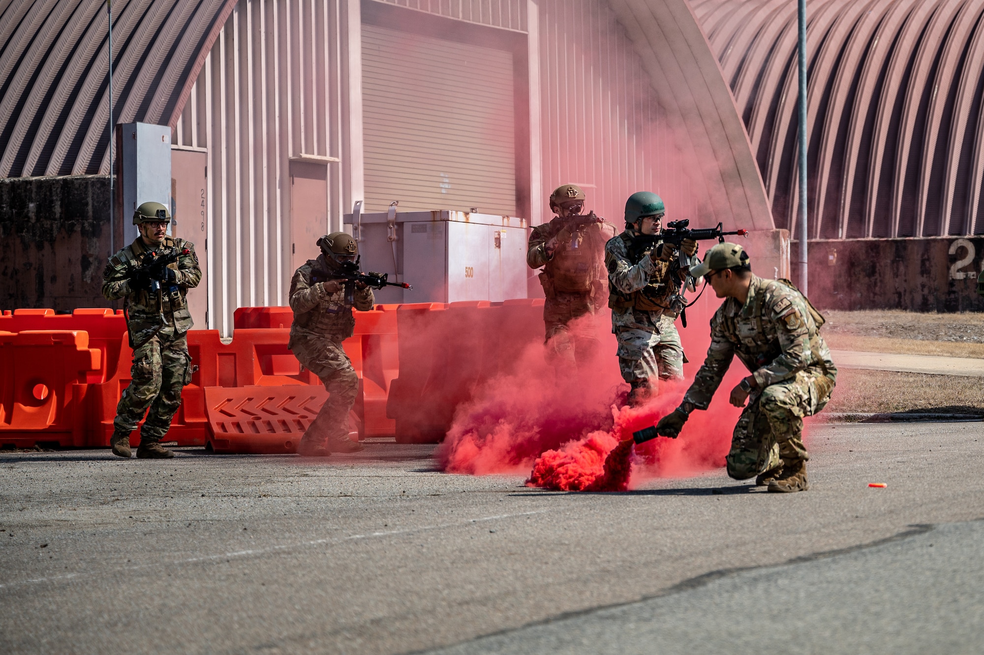 U.S. Airmen assigned to the 51st Fighter Wing respond to a simulated combat scenario during a Combat Readiness Course at Osan Air Base, Republic of Korea, March 14, 2024. The Combat Readiness Course is a 10-day training program that covers theater-specific combat tactics, critical life-saving techniques, and base defense procedures, designed to thoroughly prepare Airmen for encountering potential real-world threats. (U.S. Air Force photo by Staff Sgt. Thomas Sjoberg)