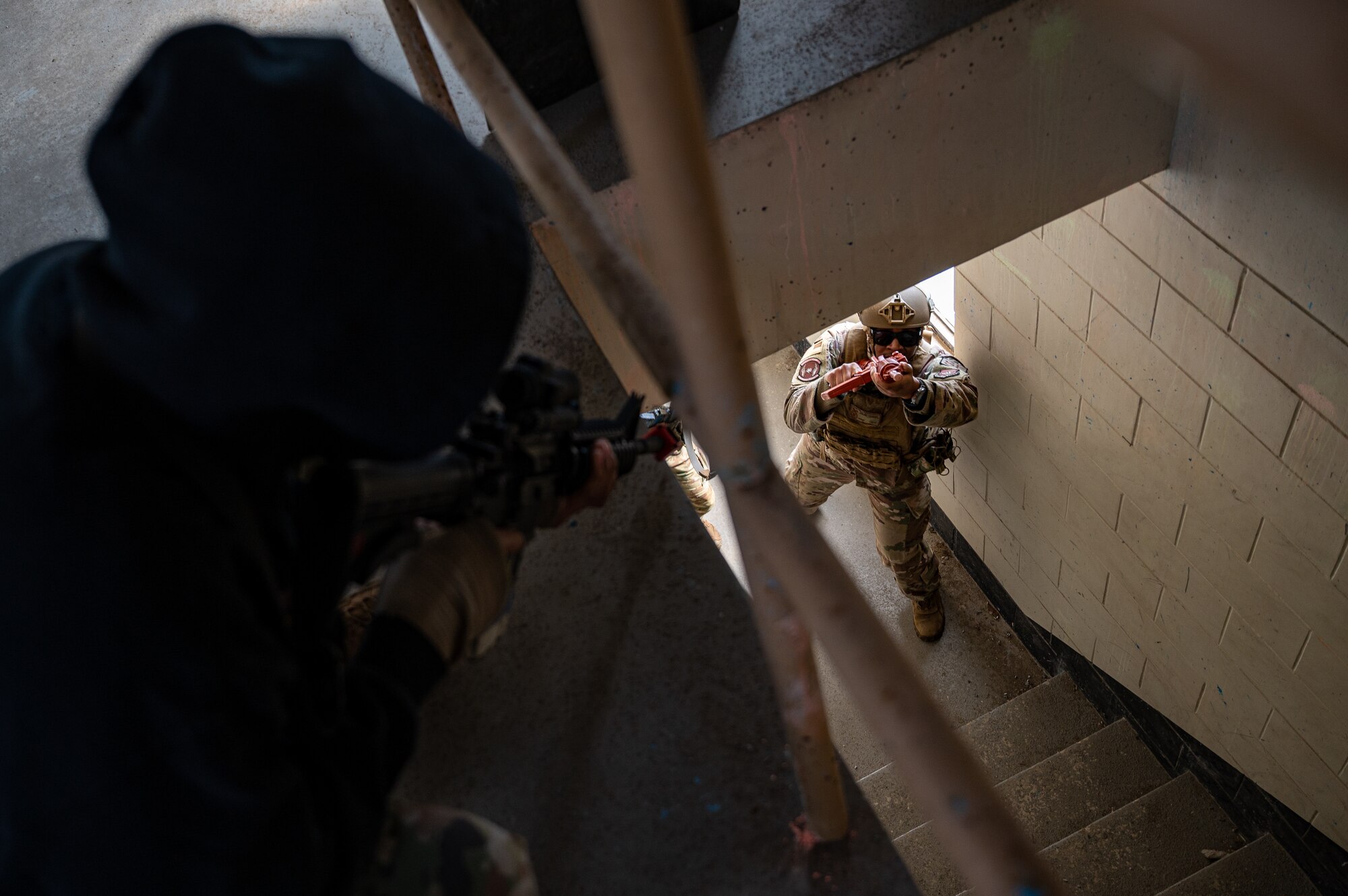U.S. Air Force Staff Sgt. Jaelan Cearnel, 51st Security Forces Squadron Defender, trains on room clearing tactics during a Combat Readiness Course at Osan Air Base, Republic of Korea, March 14, 2024. The CRC trains 51st Fighter Wing Airmen on base defense procedures, preparing them to tackle any challenge and deter any adversary during contingency operations. (U.S. Air Force photo by Staff Sgt. Thomas Sjoberg)