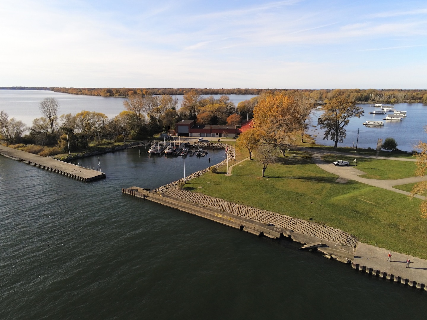 Piers line a navigation channel connecting Erie Harbor to Lake Erie.