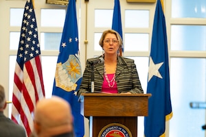 Ret. Col. Karen Esaias gives remarks to audience during second annual OSI Women's History Month luncheon March 28, 2024.