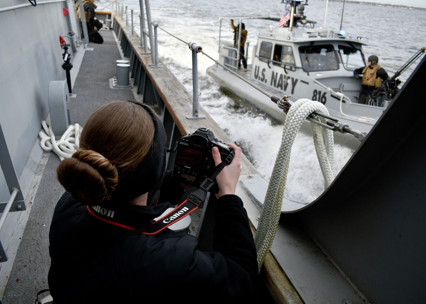 ANNAPOLIS, Maryland (March 26, 2024) - Mass Communication Specialist 1st Class Lorenzo Burleson of the Navy Reserve Chief of Information Office (NR-CHINFO) unit performs Operational Task Visual Information (OPTASK VI) training aboard a U.S. Naval Academy Yard Patrol craft. OPTASK VI is a no-fail mission designed to capture and document unsafe, unprofessional, or nefarious activities at sea, on land, and in the air.

The NR-CHINFO Sailors coordinated with the Naval Academy and Navy Reserve Maritime Expeditionary Security Squadron EIGHT as part of Train the Force efforts to prepare them for mobilization and war fighting assignments.