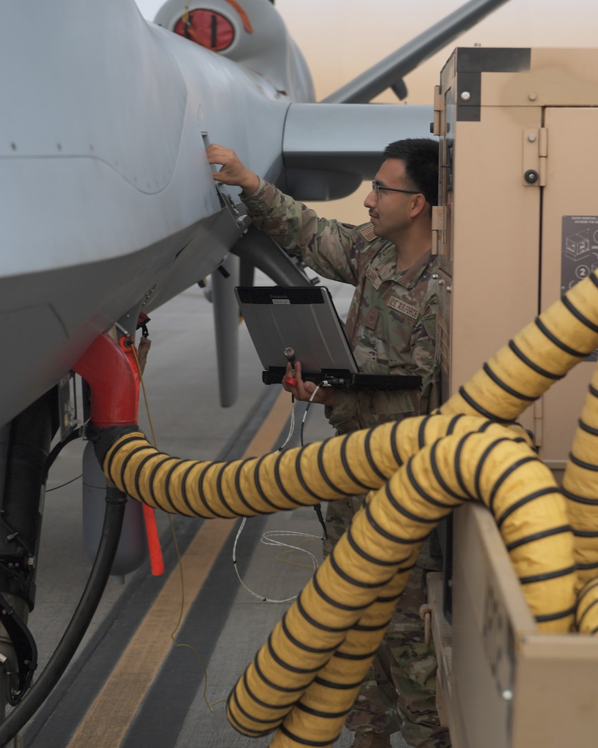 A member of the 147th Attack Aircraft Maintenance Squadron prepares an MQ-9 uncrewed aerial system for launch at Ellington Field Joint Reserve Base in Houston March 7, 2024. The 147th deployed an MQ-9 to help battle the Smokehouse Creek Fire in northern Texas, providing real-time video to civilian agencies and local firefighters.