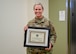 Col. Wendi Wohltmann, 59th Medical Specialty Squadron dermatopathologist and dermatologist, receives the Military Health System 2023 Award for the Advancement of Women Physicians in Military Medicine at Wilford Hall Ambulatory Surgical Center, Joint Base San Antonio-Lackland, Texas, Feb. 7, 2024. The award symbolizes the commitment of the military medical community to fostering an inclusive environment where all healthcare professionals, regardless of gender, can thrive and contribute effectively to the mission of providing high-quality medical care to service members and their families. (U.S. Air Force photo by Senior Airman Melody Bordeaux)