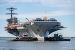 NEWPORT NEWS, Va. (April 8, 2024) The Nimitz-class aircraft carrier USS John C. Stennis (CVN 74) is moved to an outfitting berth at Newport News Shipbuilding in Newport News, Virginia, April 8, 2024. John C. Stennis is conducting refueling and complex overhaul to prepare the ship for the second half of its 50-year service life. (U.S. Navy photo by Mass Communication Specialist 2nd Class Simon Pike)