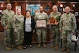Maj. Gen. Reginald Neal, center, deputy commanding general for the U.S. Army Pacific for Mobilization and Reserve Affairs, is presented with the Ancient Order of the Chamorri by Guam Governor Lou Leon Guerrero and Brig. Gen. Mike Cruz, adjutant general of the Guam National Guard, Hagåtña, March 28, 2024.