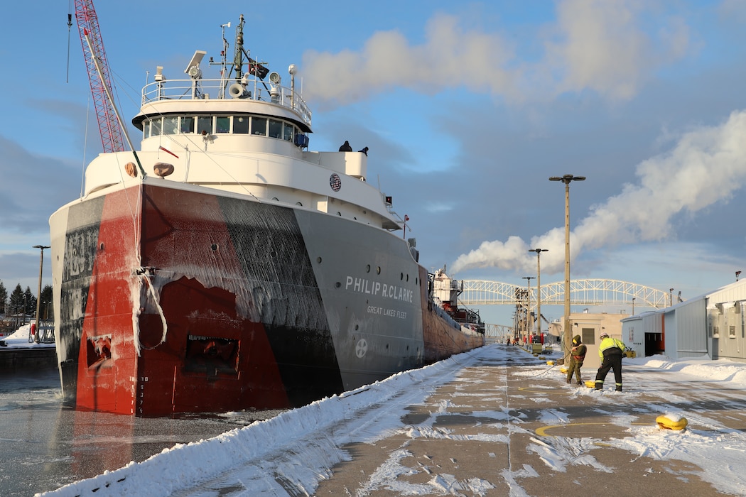 A U.S. Army Corps of Engineers lock and dam line hander moors the Philip R. Clarke in the Poe Lock.