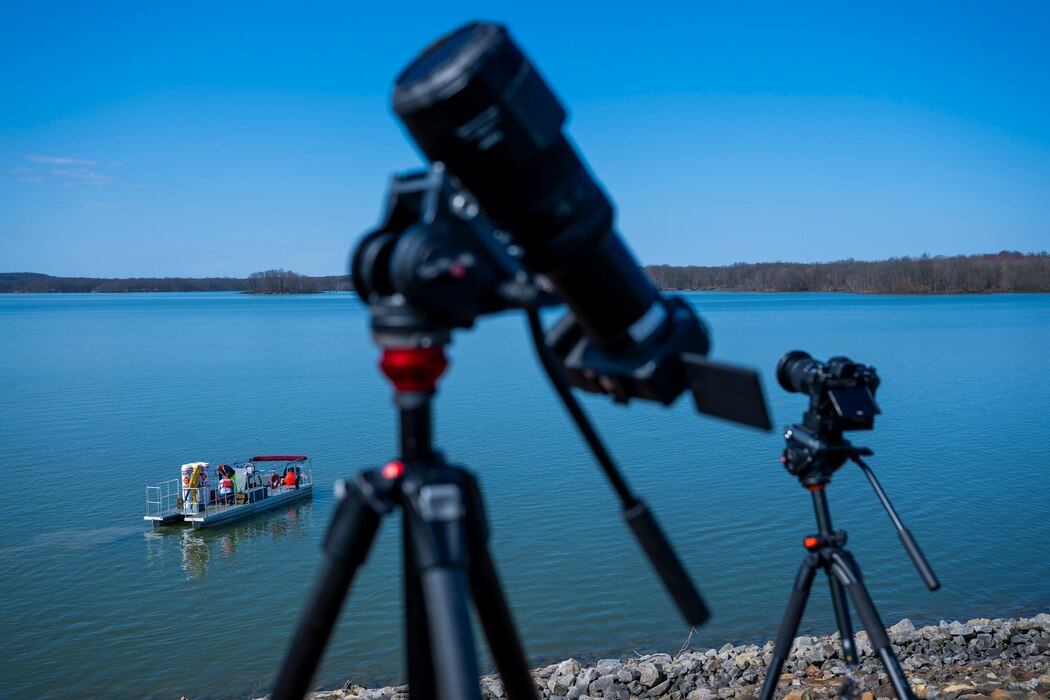 A total solar eclipse shines in the sky viewed from the Michael J. Kirwan Dam in Ravenna, Ohio, April 8, 2024.