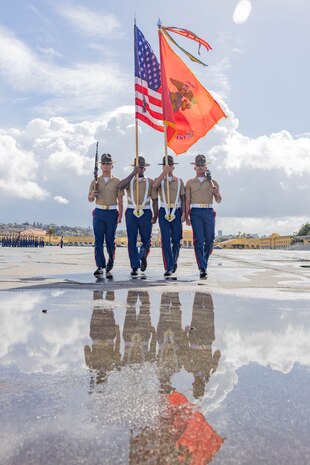 U.S. Marines with the Marine Corps Recruit Depot San Diego color guard, march on the colors during the Hotel Company graduation ceremony at MCRD San Diego, California, April 5, 2024. Graduation takes place at the end of the 13-week transformation, which included training for drill, marksmanship, basic combat skills, and Marine Corps customs and traditions. (U.S. Marine Corps photo by Lance Cpl. Janell B. Alvarez)