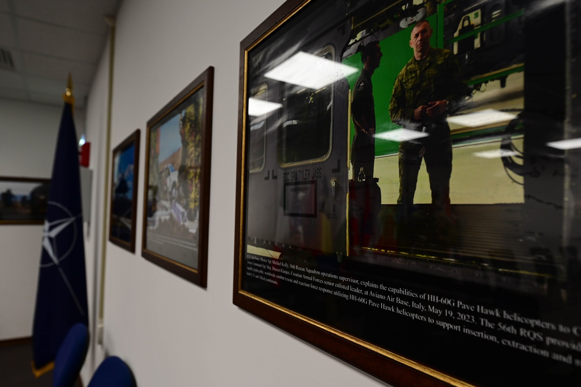Picture hangs on wall.