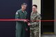 From left, Italian air force Col Salvatore La Luce, ITAF base commander, and Brig. Gen. Tad Clark, 31st Fighter Wing Commander, cut a ribbon to signify the official opening of the first Joint Collaboration Center at Aviano Air Base, Italy, April 5, 2024. The JCC will serve as the 31st Fighter Wing’s dedicated space for NATO secret-level collaborations. (U.S. Air Force photo by Senior Airman Raya Feltner)