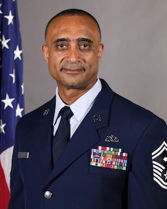 U.S. Air Force Senior Master Sgt. Roland Cooper, first sergeant assigned to the 103rd Rescue Squadron of the 106th Rescue Wing, poses for official photo at F.S. Gabreski Air National Guard Base, Westhampton Beach, New York, Jan. 18, 2024. Sgt. Cooper was selected as the top first sergeant in the New York Air National Guard and the northeast for 2023. (U.S. Air National Guard photo by Capt. Cheran A. Campbell)