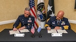 U.S. Space Force Gen. Stephen Whiting, U.S. Space Command commander, and Gen. Luis H. De León Pepelescov, Chief of Uruguayan Air Force, sign a Space Situational Awareness information-sharing agreement during Space Symposium 39 in Colorado Springs, Colo., April 9, 2024. USSPACECOM’s SSA program represents more than 185 partners from the commercial sector, academia, and foreign and intergovernmental organizations committed to enhancing the safety, stability, and sustainability of spaceflight for all.