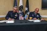 U.S. Space Force Gen. Stephen Whiting, U.S. Space Command commander, and Gen. Luis H. De León Pepelescov, Chief of Uruguayan Air Force, sign a Space Situational Awareness information-sharing agreement during Space Symposium 39 in Colorado Springs, Colo., April 9, 2024. USSPACECOM’s SSA program represents more than 185 partners from the commercial sector, academia, and foreign and intergovernmental organizations committed to enhancing the safety, stability, and sustainability of spaceflight for all.